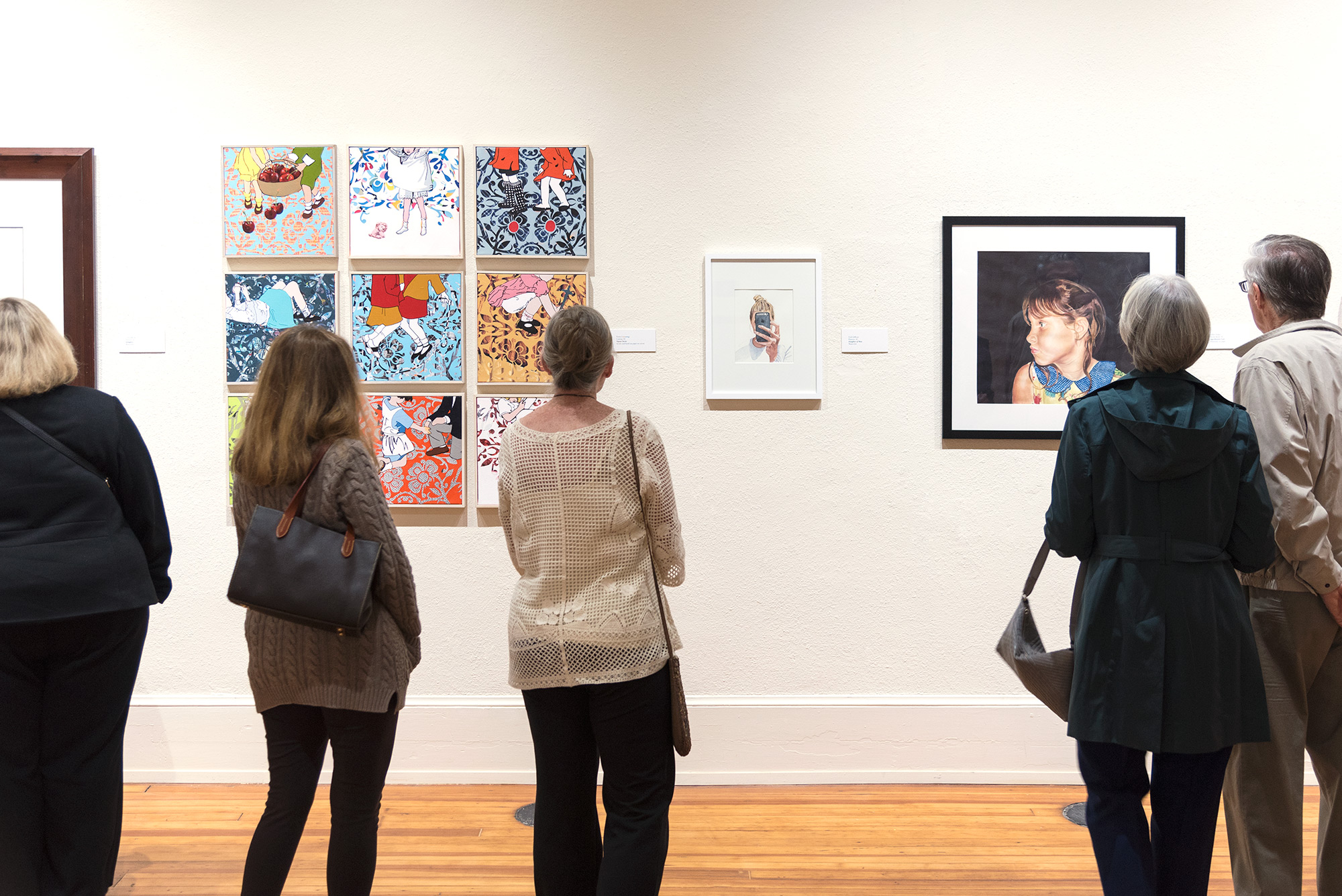 Artwork pictured left to right: Voyeur Series by Yvette L. Cummings, Daughter of Man by Uschi Jeffcoat, and Apprehensive Love (3rd place) by Ashley Arakas.